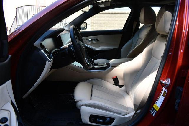 Photo of 2022 Sunset Orange Metallic BMW 330