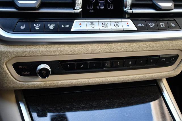 Photo of 2022 Sunset Orange Metallic BMW 330