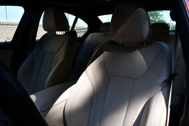 Photo of 2022 Sunset Orange Metallic BMW 330