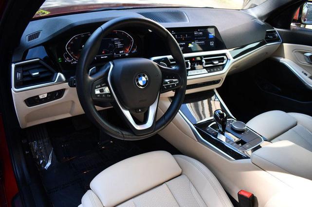 Photo of 2022 Sunset Orange Metallic BMW 330