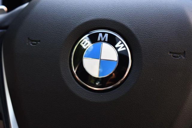 Photo of 2022 Sunset Orange Metallic BMW 330