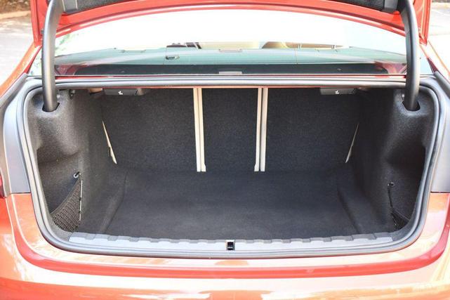 Photo of 2022 Sunset Orange Metallic BMW 330