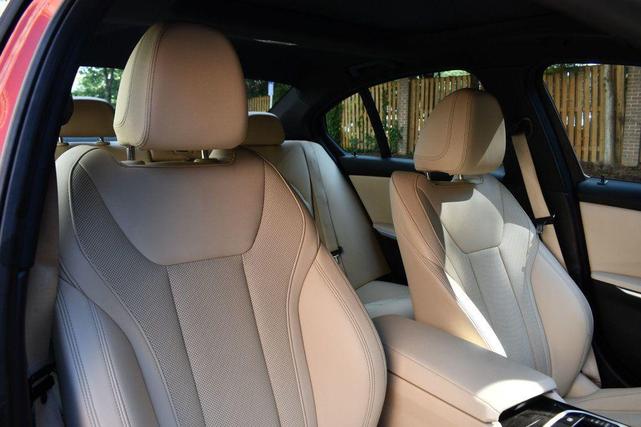 Photo of 2022 Sunset Orange Metallic BMW 330