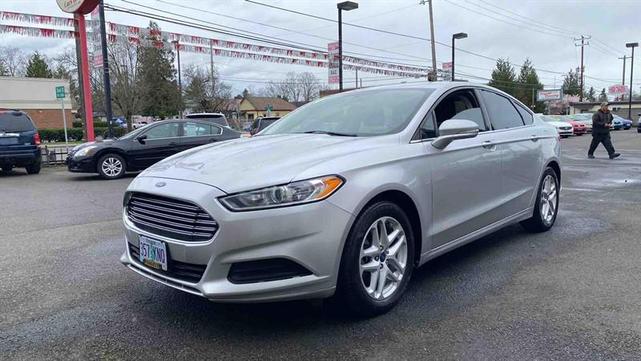 Photo of 2014 Ingot Silver Metallic Ford Fusion