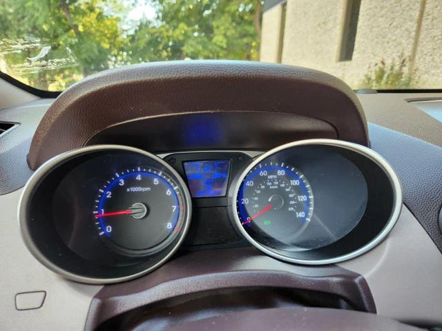 Photo of 2015 Garnet Red Mica Hyundai TUCSON
