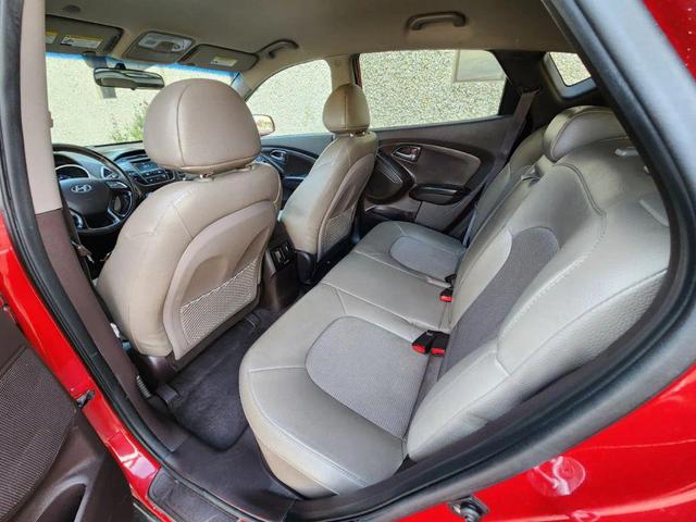 Photo of 2015 Garnet Red Mica Hyundai TUCSON