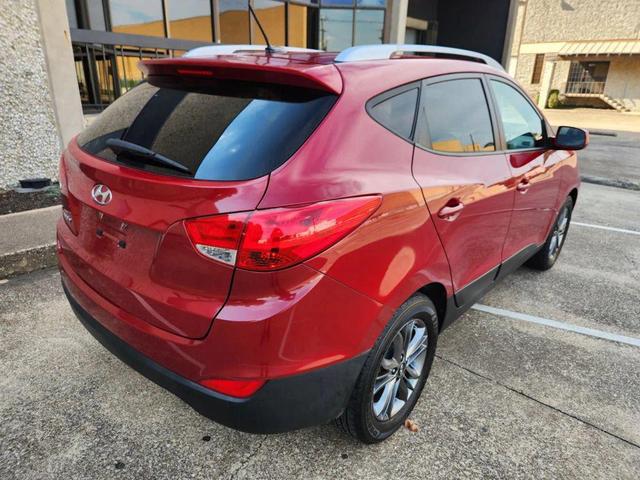 Photo of 2015 Garnet Red Mica Hyundai TUCSON