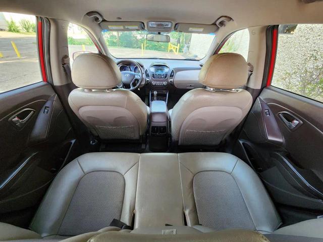 Photo of 2015 Garnet Red Mica Hyundai TUCSON