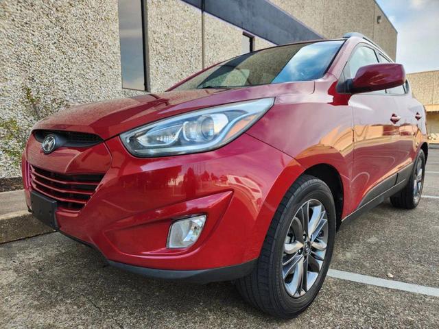 Photo of 2015 Garnet Red Mica Hyundai TUCSON