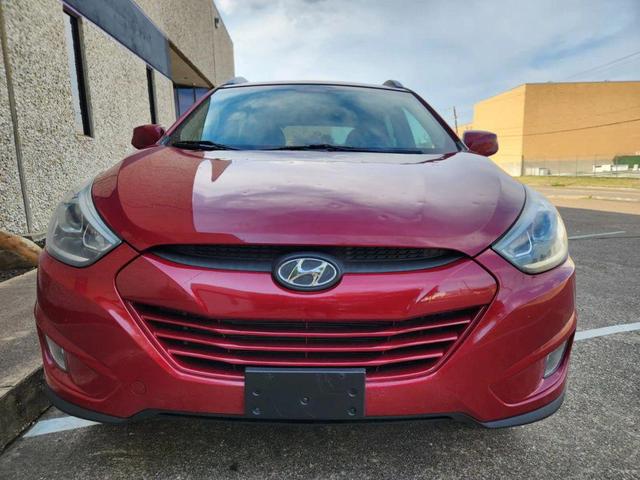 Photo of 2015 Garnet Red Mica Hyundai TUCSON