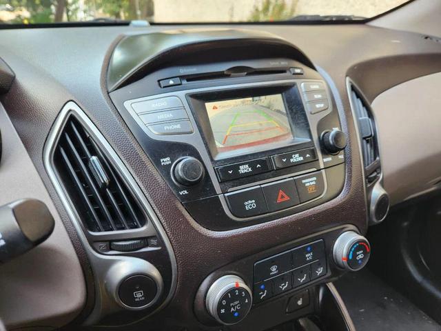 Photo of 2015 Garnet Red Mica Hyundai TUCSON