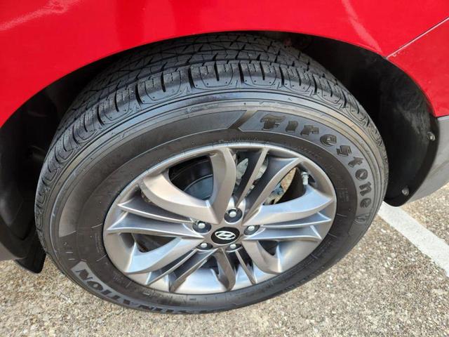 Photo of 2015 Garnet Red Mica Hyundai TUCSON
