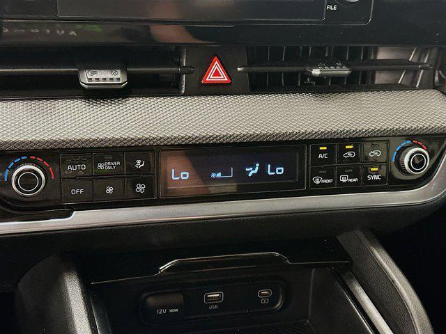 Photo of 2023 Steel Gray Kia Sportage Hybrid