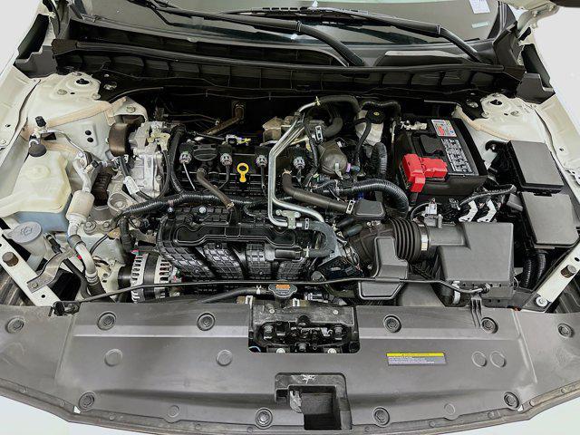 Photo of 2023 Pearl White Tricoat Nissan Altima