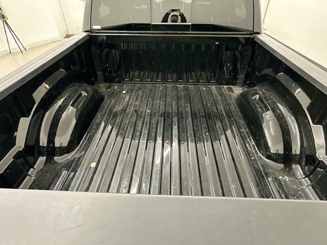 Photo of 2023 Diamond Black Crystal Pearlcoat RAM 1500