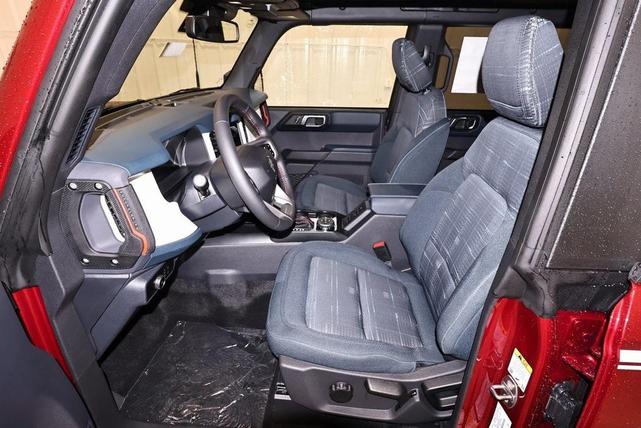 Photo of 2025 Ruby Red Metallic Tinted Clearcoat Ford Bronco