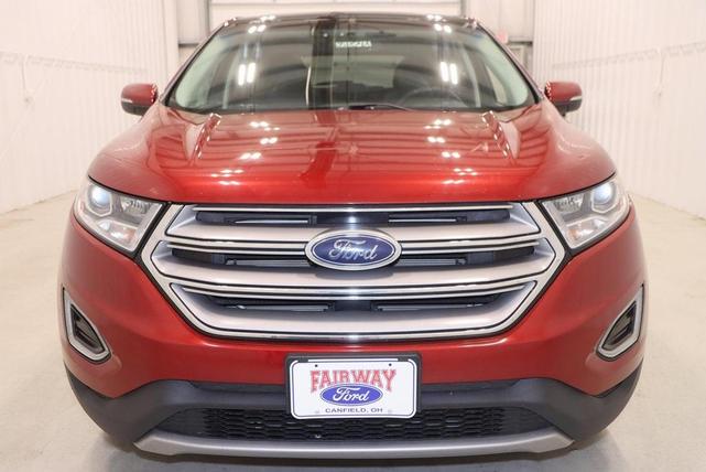 Photo of 2016 Ruby Red Metallic Tinted Clearcoat Ford Edge
