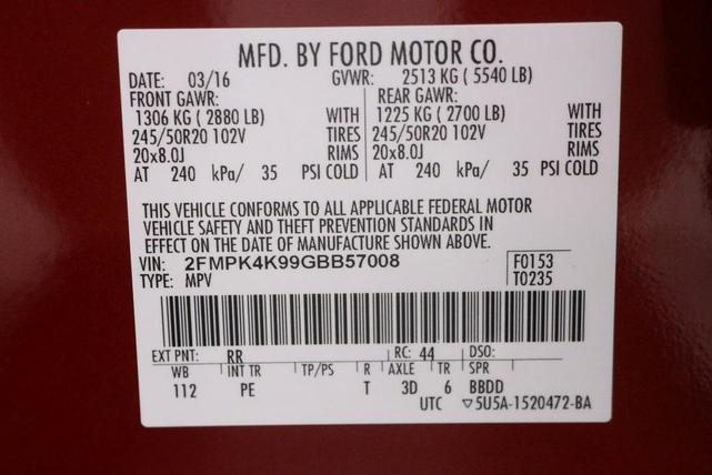 Photo of 2016 Ruby Red Metallic Tinted Clearcoat Ford Edge