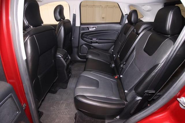 Photo of 2016 Ruby Red Metallic Tinted Clearcoat Ford Edge