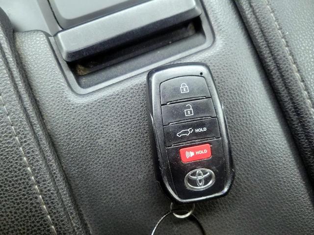 Photo of 2024 Red Toyota Grand Highlander Hybrid