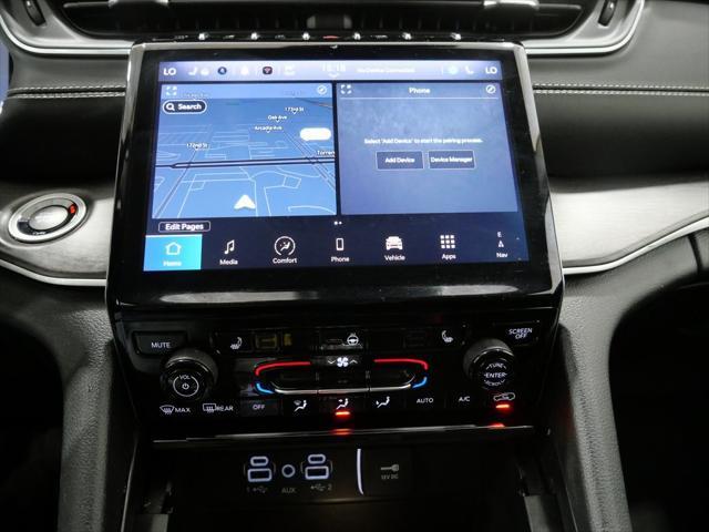 Photo of 2024 Diamond Black Crystal Pearlcoat Jeep Grand Cherokee