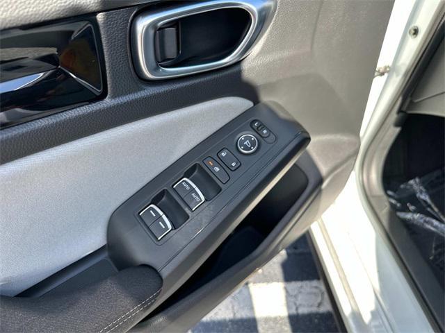Photo of 2025 Platinum White Honda Civic Hybrid