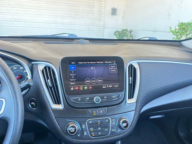Photo of 2024 Lakeshore Blue Metallic Chevrolet Malibu