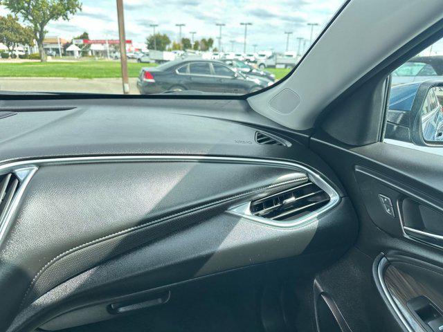 Photo of 2024 Lakeshore Blue Metallic Chevrolet Malibu