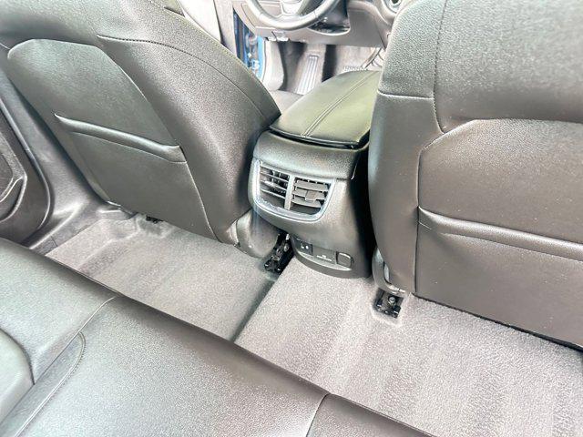Photo of 2024 Lakeshore Blue Metallic Chevrolet Malibu