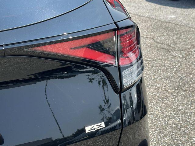 Photo of 2025 Ebony Black Kia Sportage