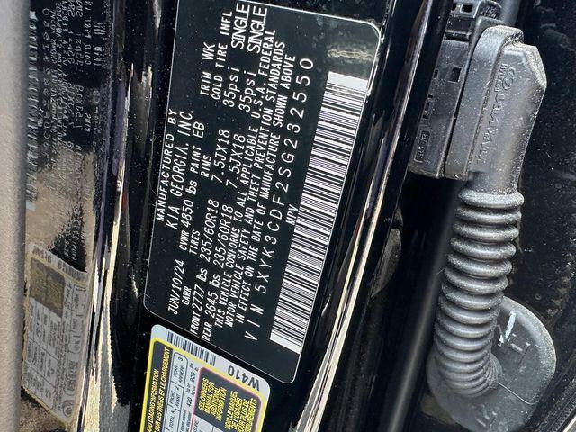 Photo of 2025 Ebony Black Kia Sportage