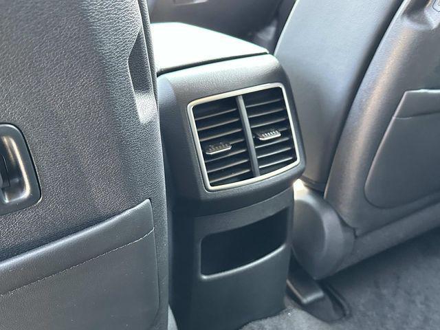 Photo of 2025 Ebony Black Kia Sportage