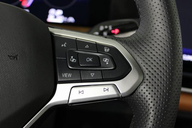 Photo of 2025 Avocado Green w/Deep Black Roof Volkswagen Tiguan