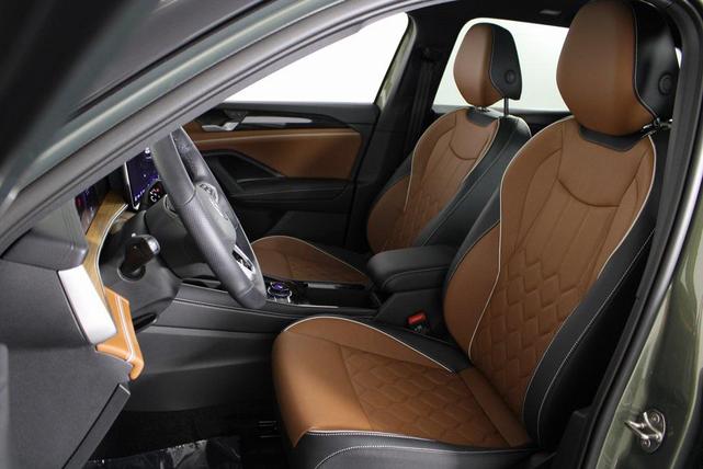 Photo of 2025 Avocado Green w/Deep Black Roof Volkswagen Tiguan