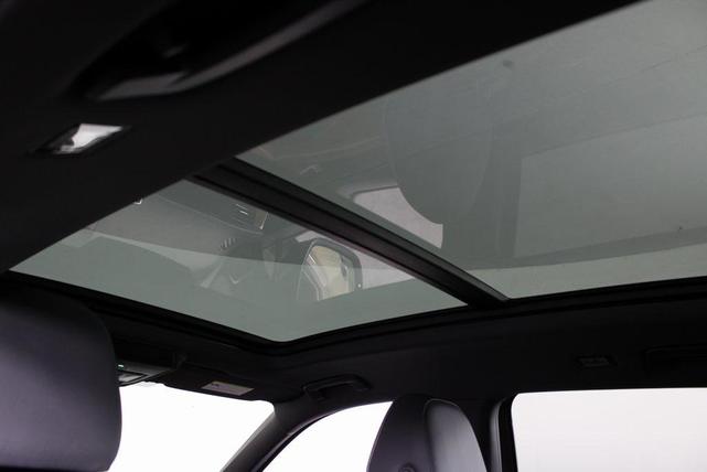 Photo of 2025 Avocado Green w/Deep Black Roof Volkswagen Tiguan