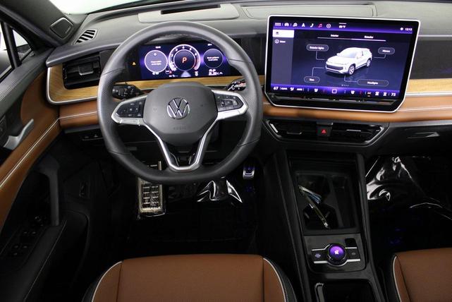 Photo of 2025 Avocado Green w/Deep Black Roof Volkswagen Tiguan