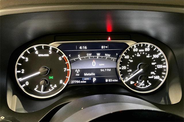 Photo of 2023 Pearl White Tricoat/Super Black Nissan Rogue
