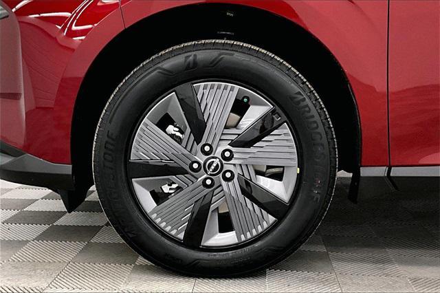 Photo of 2025 Scarlet Ember Tintcoat/Super Black Nissan Murano