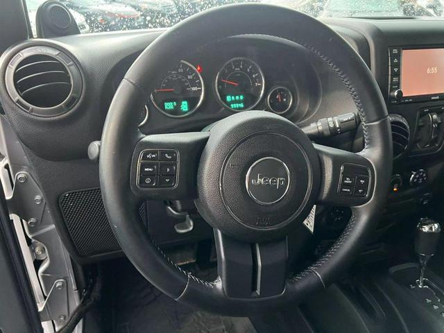 Photo of 2014 Silver Jeep Wrangler Unlimited