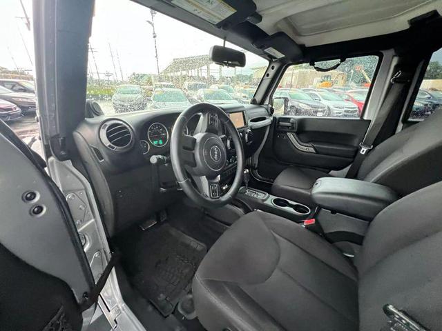 Photo of 2014 Silver Jeep Wrangler Unlimited