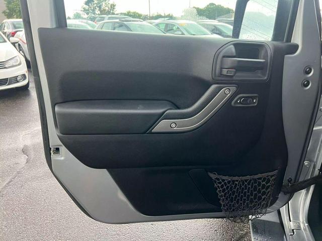 Photo of 2014 Silver Jeep Wrangler Unlimited