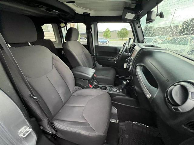 Photo of 2014 Silver Jeep Wrangler Unlimited