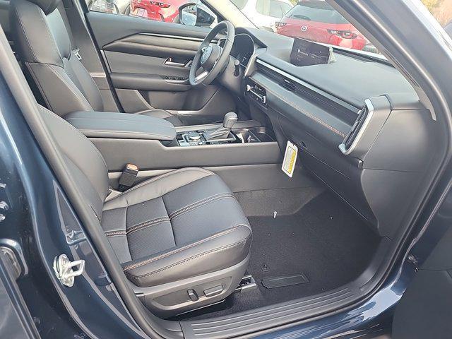 Photo of 2025 Ingot Blue Metallic Mazda CX-50 Hybrid
