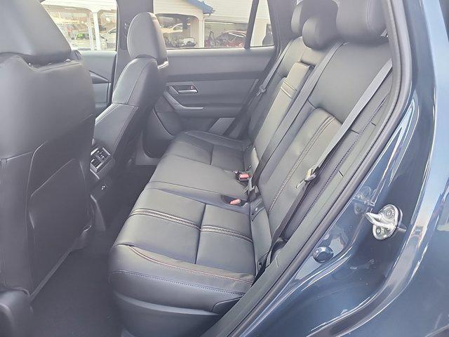 Photo of 2025 Ingot Blue Metallic Mazda CX-50 Hybrid