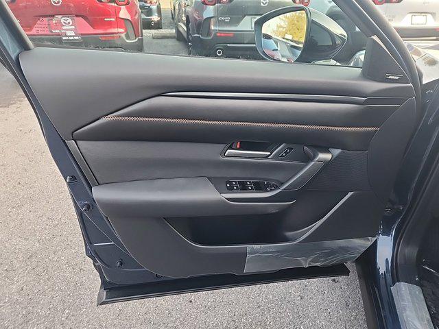 Photo of 2025 Ingot Blue Metallic Mazda CX-50 Hybrid