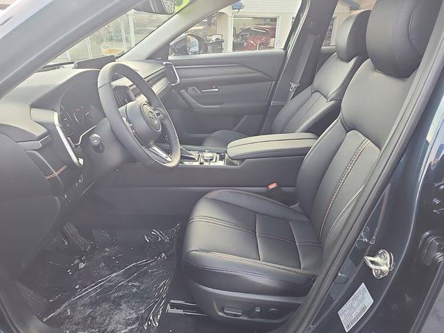 Photo of 2025 Ingot Blue Metallic Mazda CX-50 Hybrid