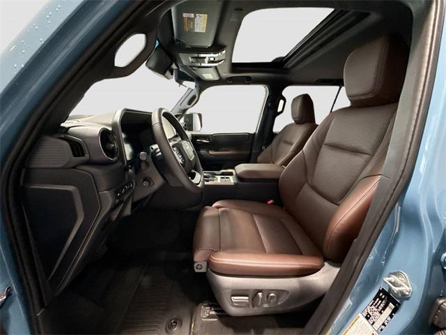 Photo of 2024 Heritage Blue/Gray Scape Toyota Land Cruiser