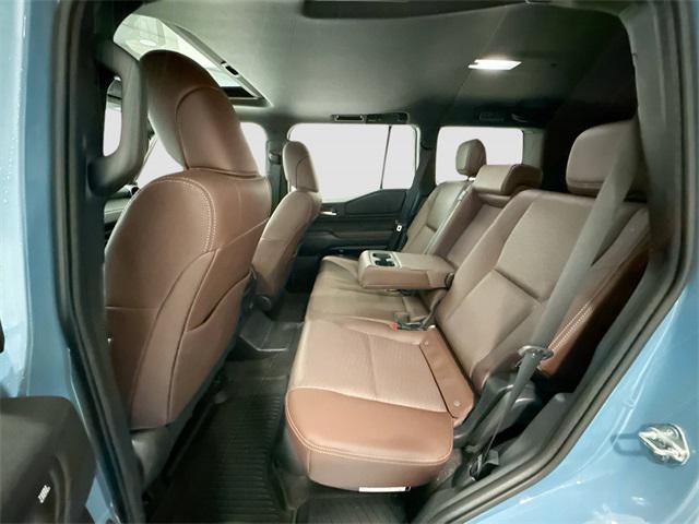 Photo of 2024 Heritage Blue/Gray Scape Toyota Land Cruiser