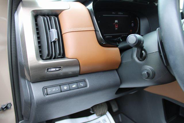 Photo of 2023 Baja Storm/Super Black Roof Nissan Pathfinder