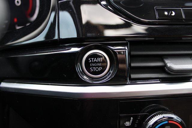 Photo of 2023 Baja Storm/Super Black Roof Nissan Pathfinder